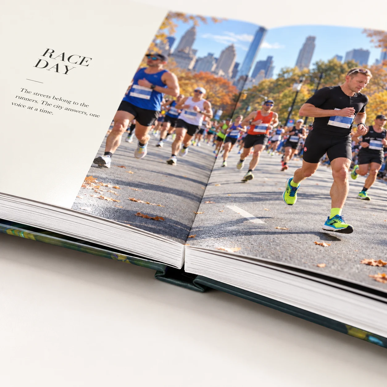 Digital close-up showing the marathon photo spread opening flat at the centre binding